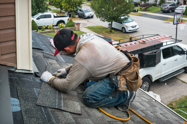 Professional Roofing technician working in Oakville, IN